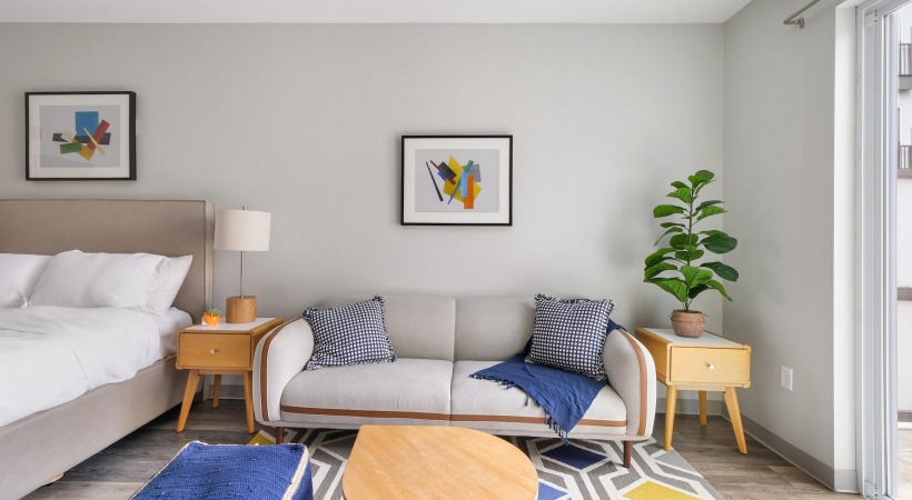 Living Room living area that includes ample seating spaces and bright lighting